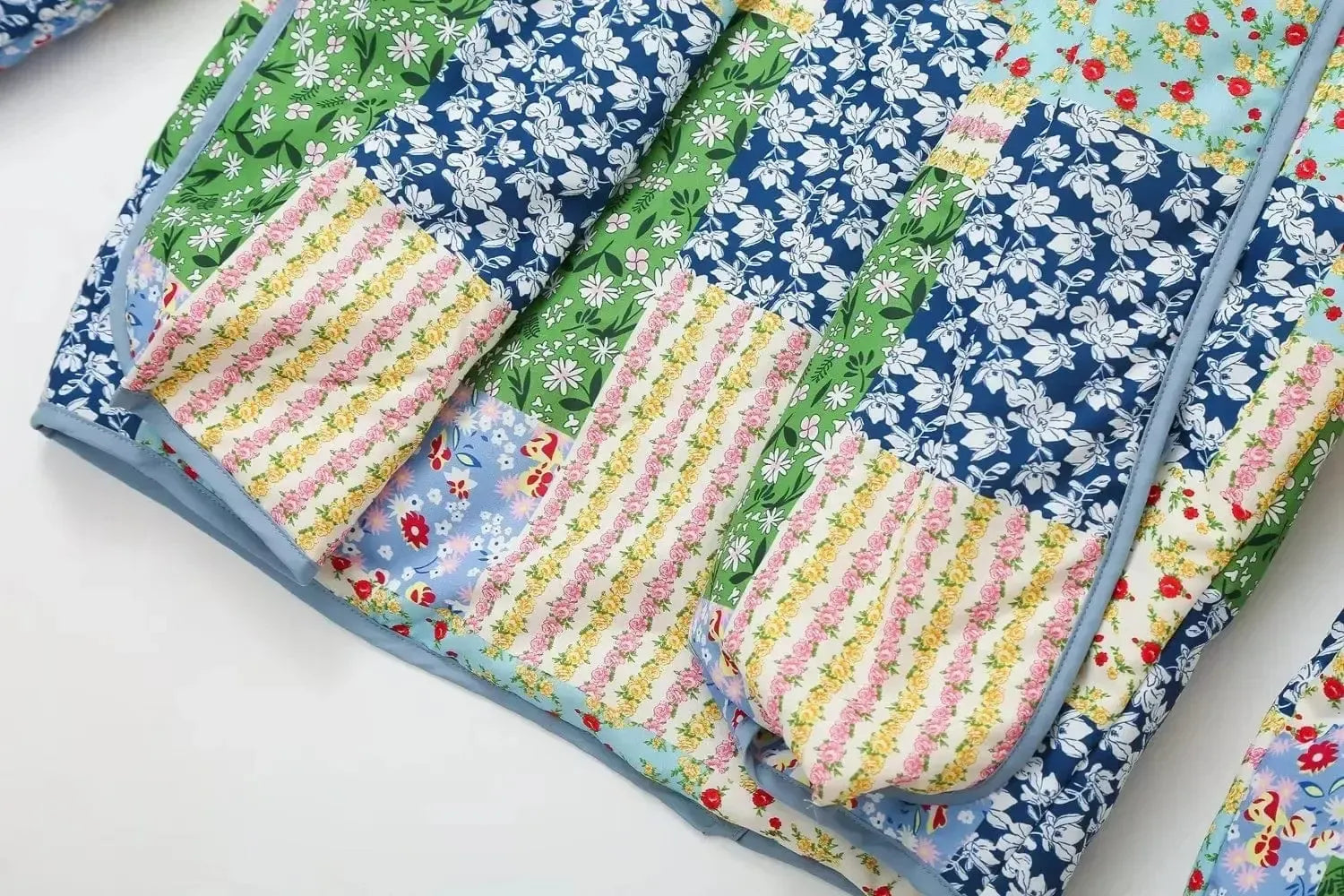 Veste matelassée patchwork fleurie-Atelier Matelassé