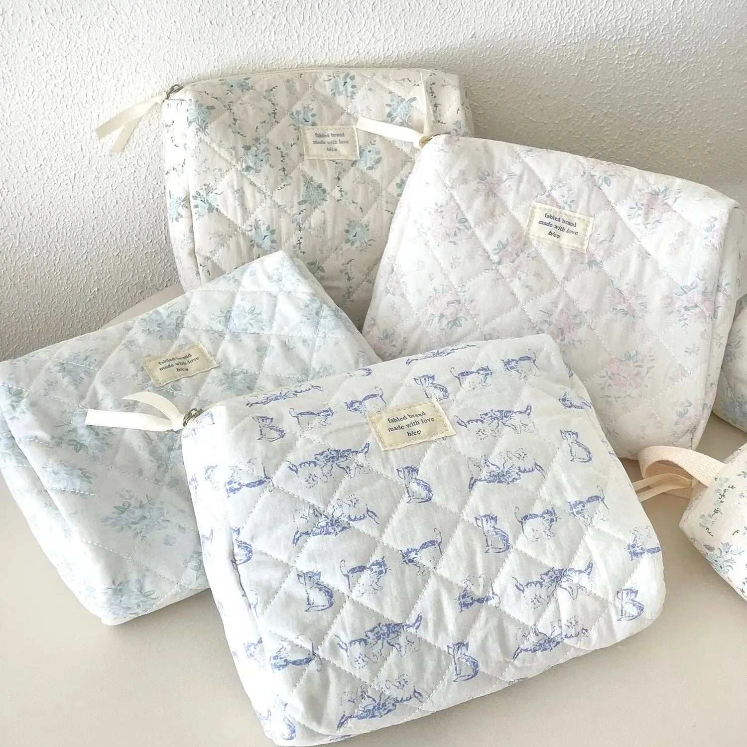 Pochette matelassée fleurie-Atelier Matelassé