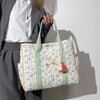 Sac à langer matelassé à ponpon Vert-Atelier Matelassé