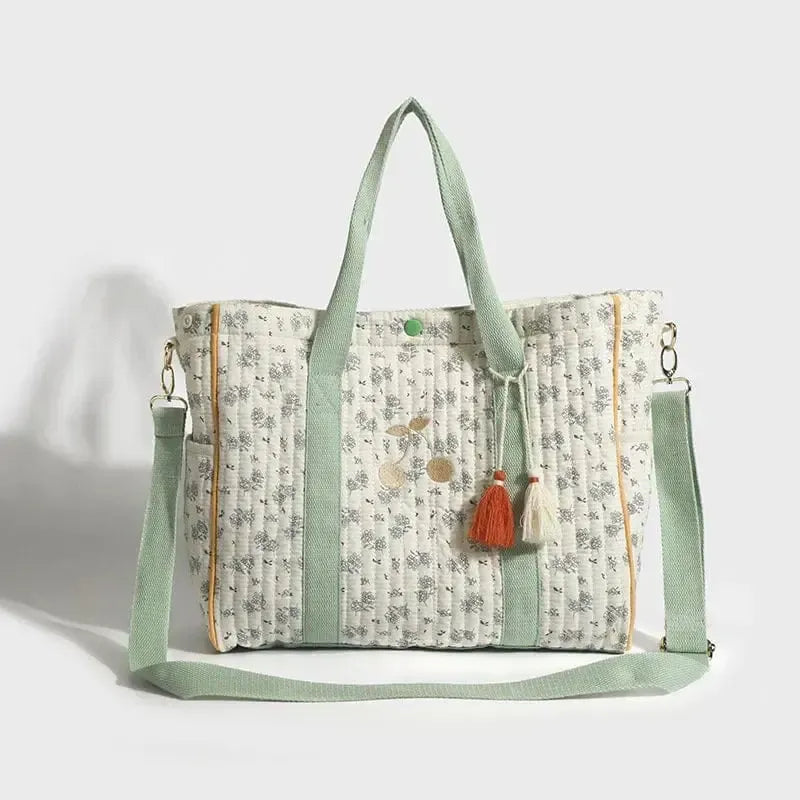 Sac à langer matelassé à ponpon Vert-Atelier Matelassé