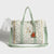 Sac à langer matelassé à ponpon Vert-Atelier Matelassé
