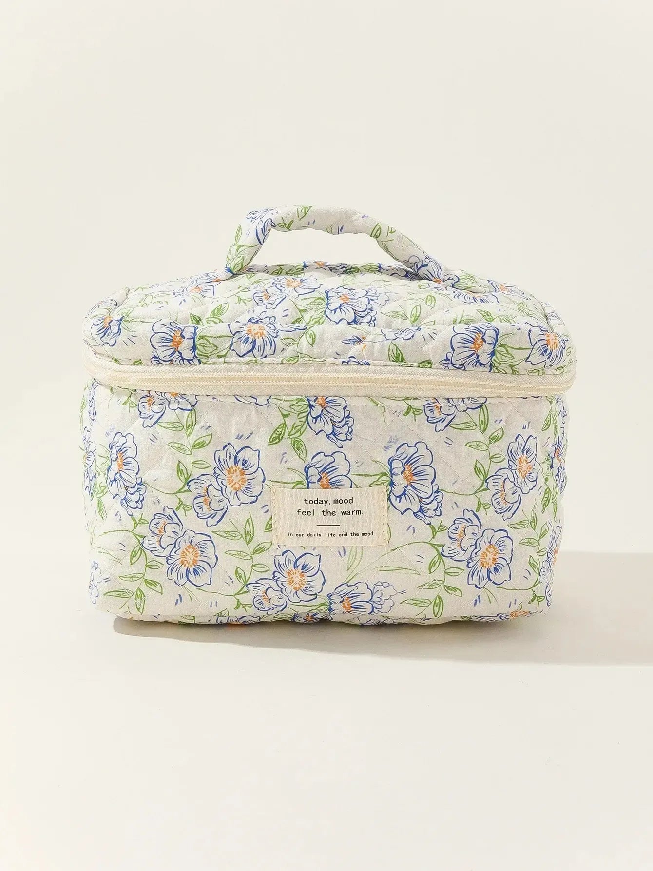 Trousse de toilette matelassée Fleurie-Atelier Matelassé