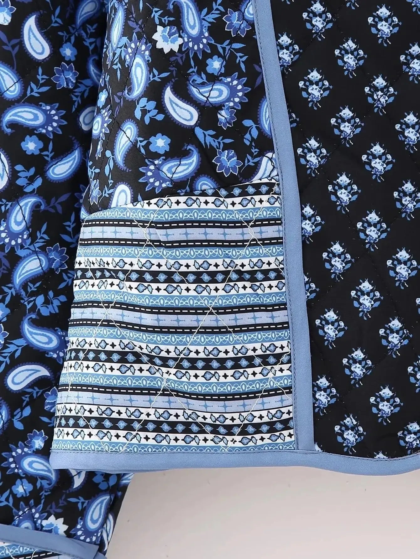 Veste matelassée fleurie réversible-Atelier Matelassé