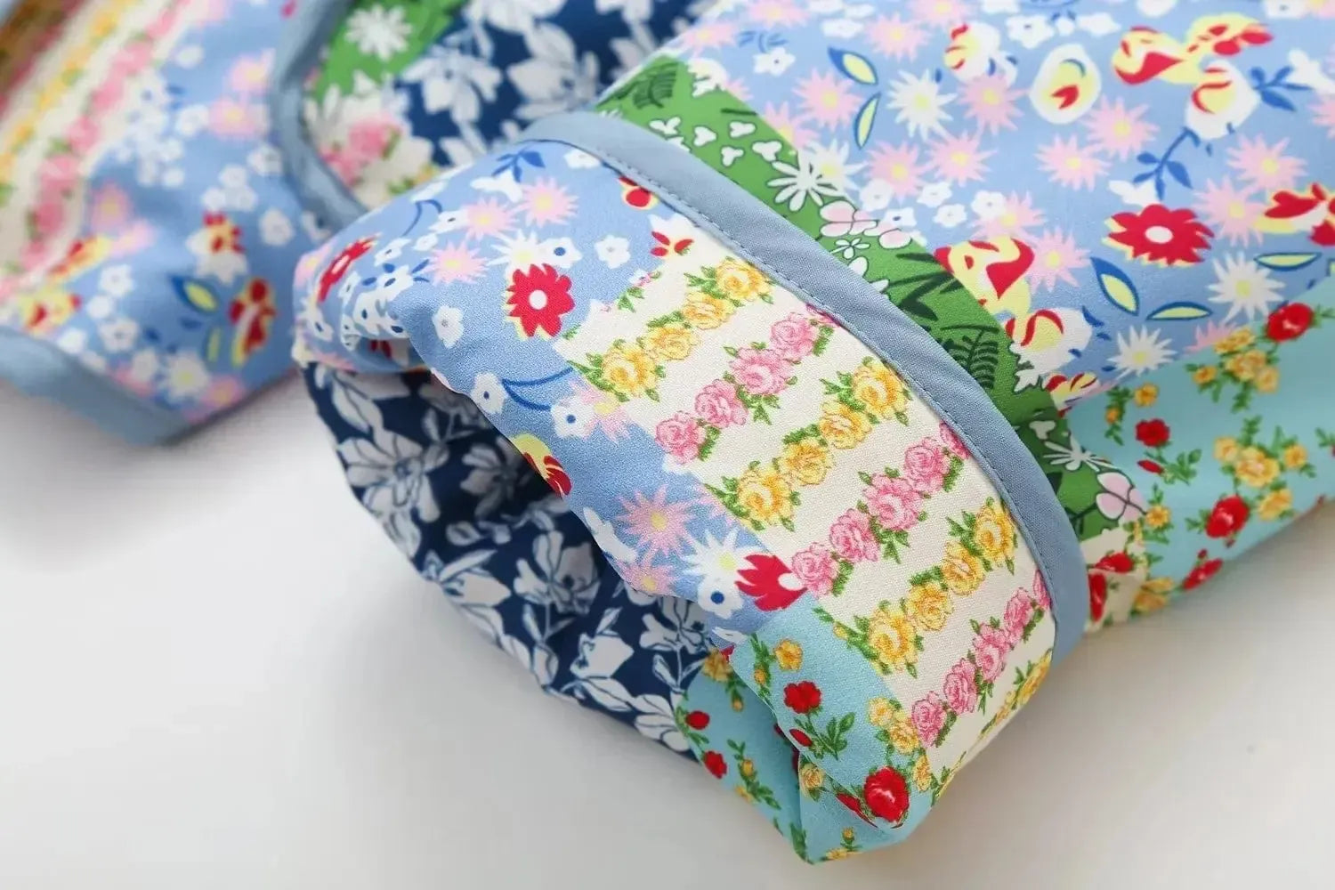Veste matelassée patchwork fleurie-Atelier Matelassé